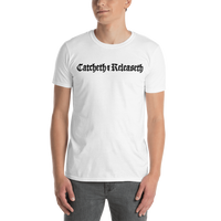 Model wearing funny fishing t shirt with catch and release joke text.