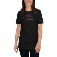 Model wearing women's fishing t shirt with baitcasting reel design and modern text.