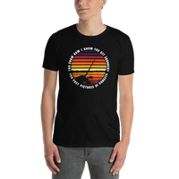 Model wearing funny fishing t shirt with sunset design and text.