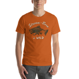 Model wearing fly fishing t shirt with brook trout design and text.